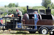 Cooking the beef. Photo by Dawn Ballou, Pinedale Online.