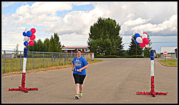 Crossing the Finish Line. Photo by Terry Allen.