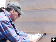 Caulking. Photo by Dawn Ballou, Pinedale Online.