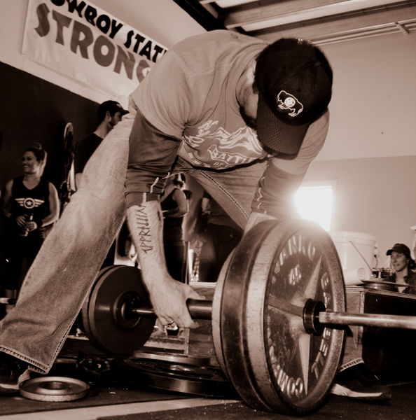 Andrew Sets the Weight. Photo by Terry Allen.