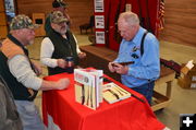 Gun talk. Photo by Terry Allen, Pinedale Online.