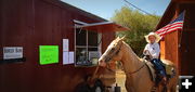 Rooster waiting for a burger. Photo by Terry Allen.