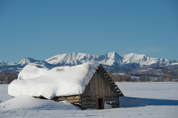 Snowy cabin. Photo by Arnold Brokling.