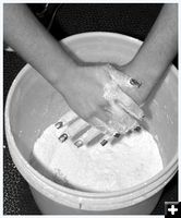 Hands in Talc. Photo by Terry Allen.