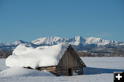 Snowy cabin. Photo by Arnold Brokling.