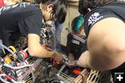 Working on the robot. Photo by Big Piney Robotics.