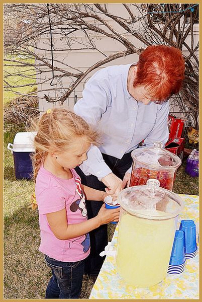 Ranch Owner Helps Young Cowgirl. Photo by Terry Allen.