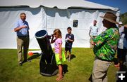 Dace and Gwen Look at Sunspots at Museum of the Mountain Man. Photo by Terry Allen.