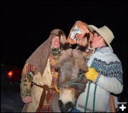 Getting the Donkey to Cooperate. Photo by Terry Allen.