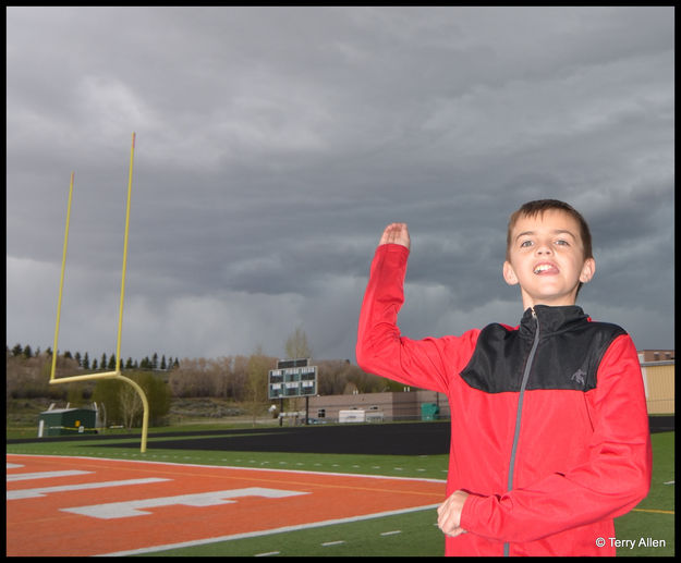 Posing for a Simulated Throwing Shot. Photo by Terry Allen.