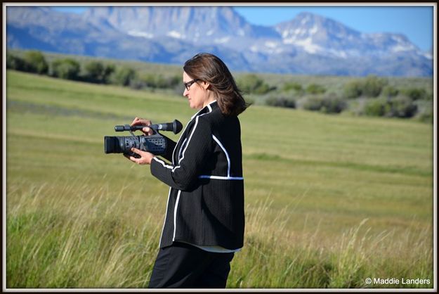 Recording the Wind in the Grass. Photo by Maddie Landers.