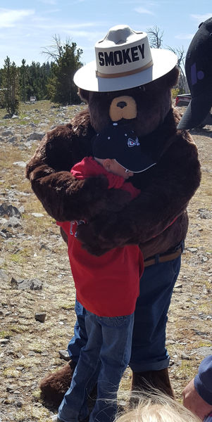 Hug from Smokey. Photo by Clint Gilchrist, Sublette County Historic Preservation Board.