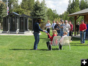 Presenting flag to wife Betty. Photo by Dawn Ballou, Pinedale Online.